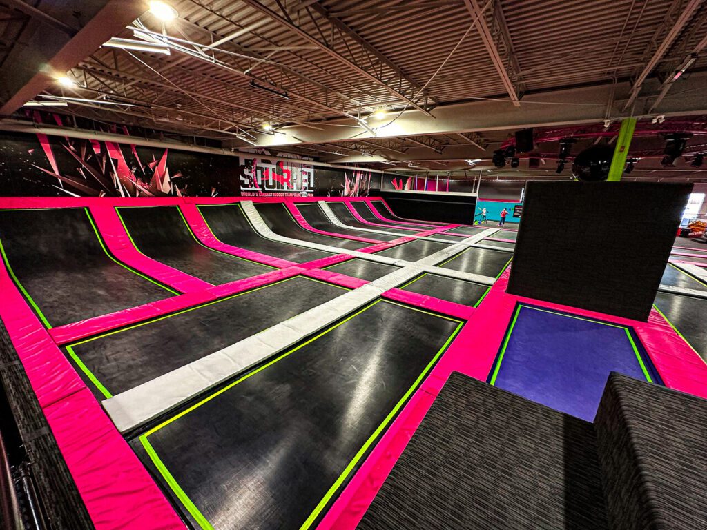 Families having fun at The Jumpoff London trampoline park